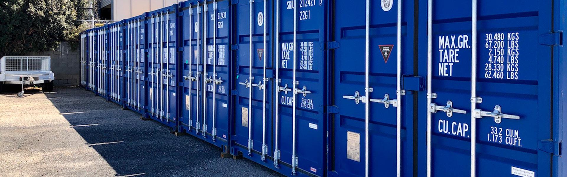 row of blue storage containers at the nbs storage facility